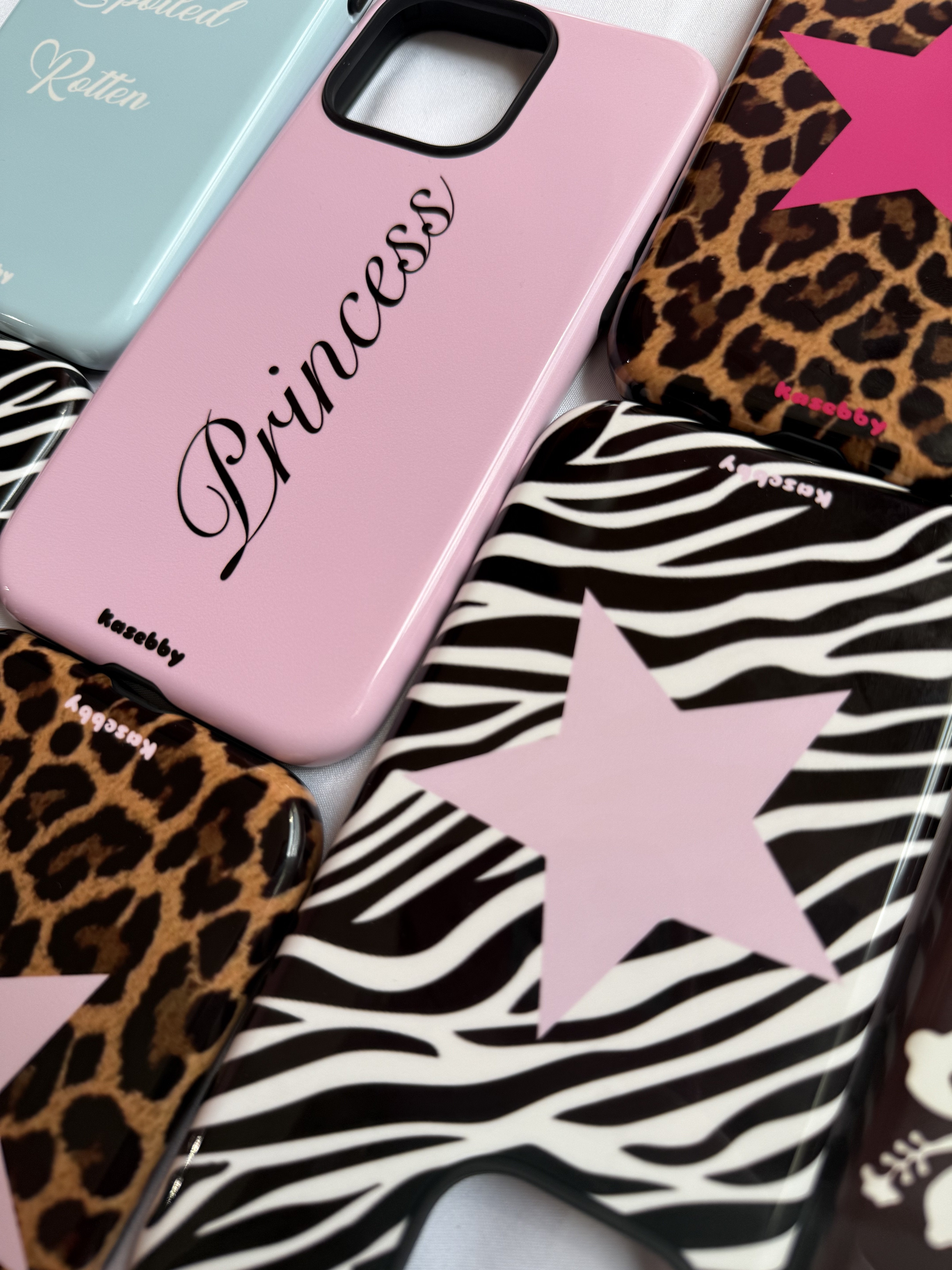 Aesthetic phone cases side by side
